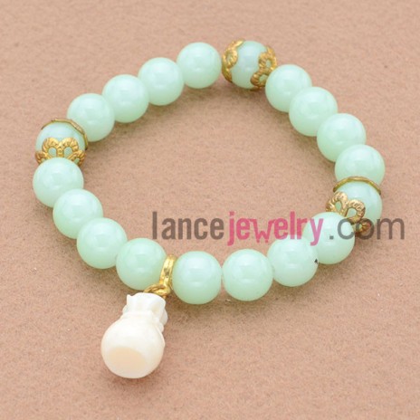 Nobby pure green color bead bracelet with sweet pendant.