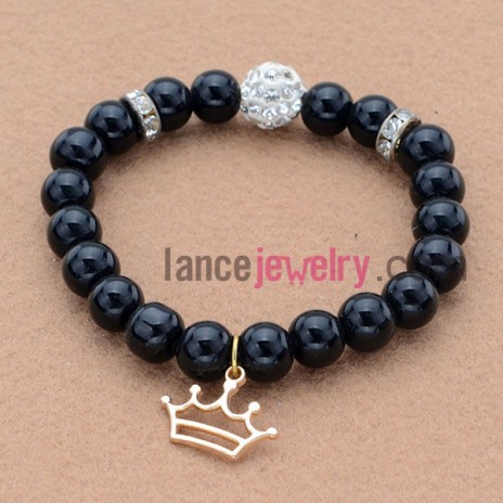 Xlassic stone bead bracelet&rhinestone decoration with alloy crown pendant.