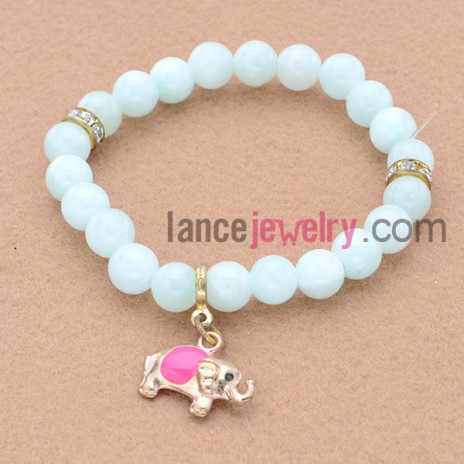 Elegant bead bracelet with alloy elephant pendant.