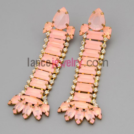 Lovely earrings with brass decorate pink resin with special shape
