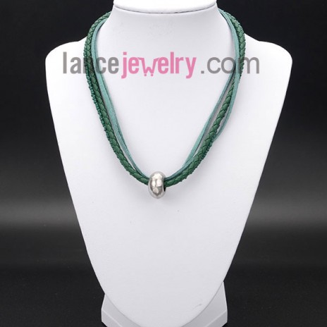 Striking necklace decorated with green measles and wax rope