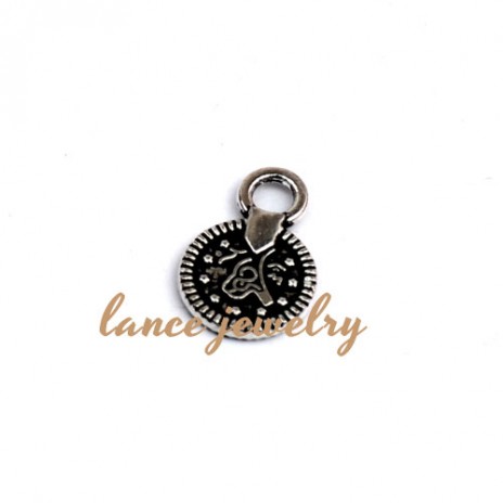 Zinc alloy pendant, a 10mm round pendant, flower patterns printed on the edge and middle a big flower pattern