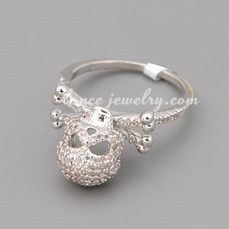 Personality ring with many shiny cubic zirconia in the skeleton shape 