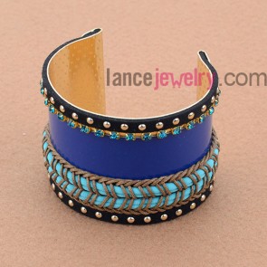 Dark color woven cord and blue color rhinestone decorated iron bangle