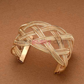 Gold color twist ornate iron cuff bangle