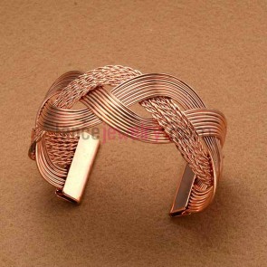 Rose gold plated twist ornate iron cuff bangle