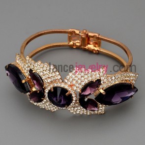 Special bracelet with brass claw chain decorated many shiny rhinestone and purple crystal 
