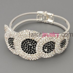 Personality  bracelet with brass claw chain decorated many shiny rhinestone in black and white color