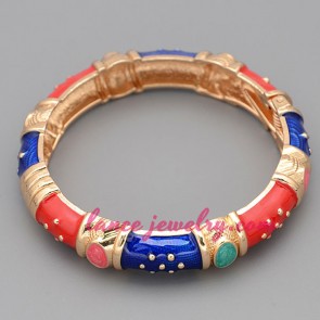 Classic bangle with red anc blue color enamel decoration