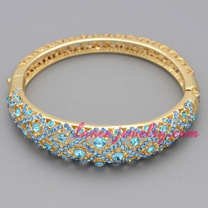 Gorgeous blue color rhinestone beads decorated pierced bangle