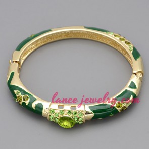 Unique bangle with green color rhinestone beads