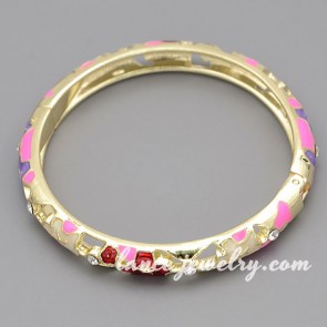 Beautiful alloy bangle with rose color enamel decoration 