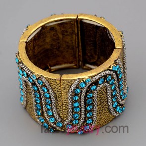 Cool bracelet with gold zinc alloy decorate shiny blue rhinestone
