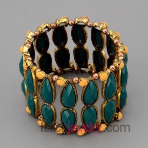 Vintage bracelet with gold zinc alloy decorate green resin