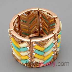 Personality bracelet with gold zinc alloy decorate different color resin and many rhinestone