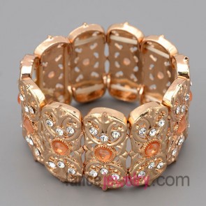 Fascinating bracelet with gold zinc alloy decorate diffreent color rhinestone with special shape