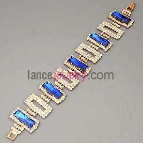 Romantic bracelet with brass claw chain in quadrilateral decorated shiny rhinestone and blue crystal 
