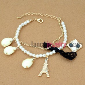 White beads chain link bracelet decorated with eiffel tower model