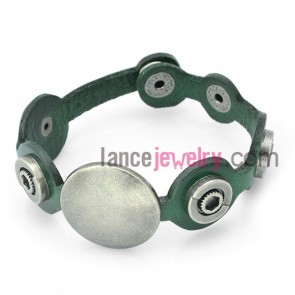 Cool bracelet decorated with green leather and snap fastener and hasp 
 
