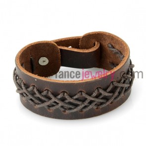 Special bracelet with brown leather decorated rope and aluminum studs