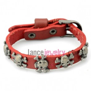 Trendy bracelet decorated with red leather decorated pin buckle and alloy skeleton 
