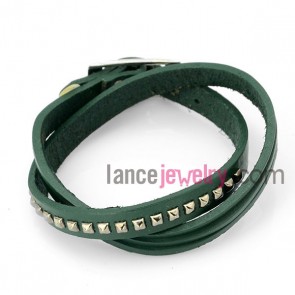 Cute bracelet with green leather decorated many rivets 

