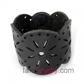Cool bracelet with black leather decorated snap fastener

