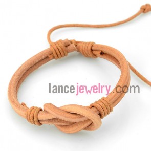 Sweet bracelet with orange leather decorated rubber

