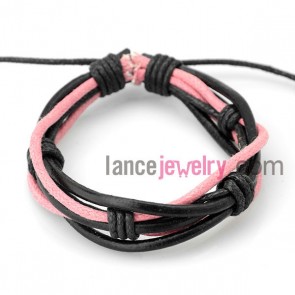 Sweet bracelet with black leather decorated pink rubber
