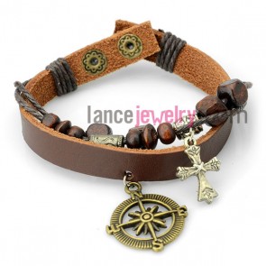 Delicate bracelet  with brown leather wrapped around rubber decorated wooden bead and alloy  pendant

