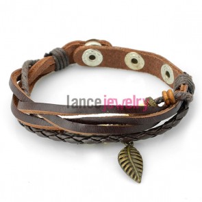 Cute bracelet  with brown leather wrapped around rubber decorated wooden bead and alloy  pendant
