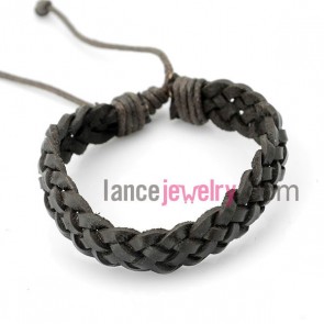 Cool bracelet decorated with black leather wrapped around  gray rubber
