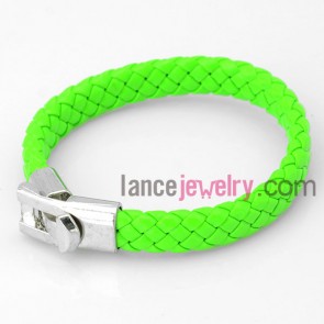 Bright bracelet with light green leather wrapped decorated cross buckle 


