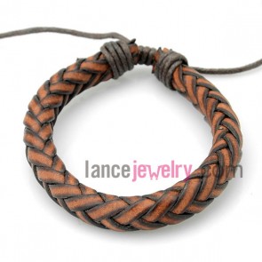 Fashion bracelet with brown  leather decorated deep gray rubber
