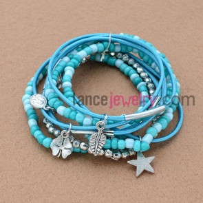 Blue seed beads & elastic cord wrap bracelet with nice alloy pendants