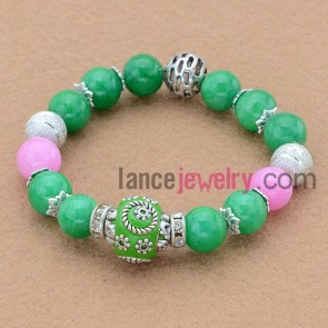 Impressive green color stone with unique accessories bead bracelet. 