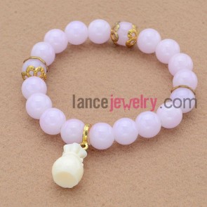 Nobby pink color bead bracelet with sweet pendant.