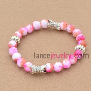 Multicolor bead bracelet with unique alloy finidings.