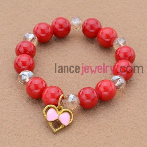 Fashion bead bracelet with bow tie pendant.