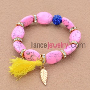 Rare pink color stone&nice rhinestone decorated bead bracelet with leaf pendant and tassels.