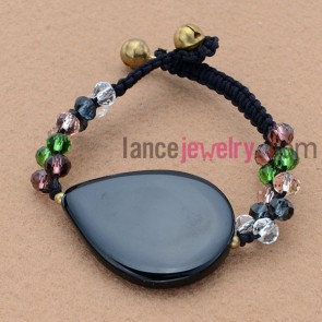 Weaving bracelet with stone and acrylic material.