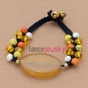 Mix color clear stone and acrylic material weaving bracelet.