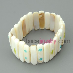 Square ivory white shell bracelet with colorful petrol dripping