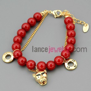 Red beads chain link bracelet decorated with animal
