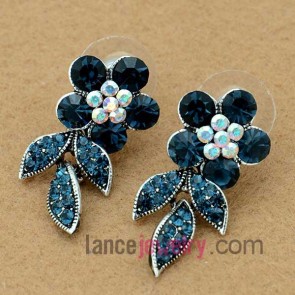 Gorgeous earrings decorated with cute blue flower