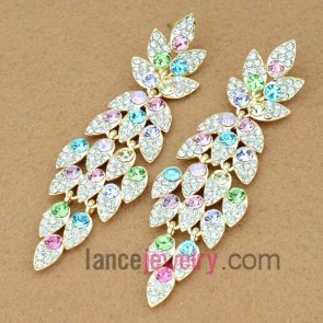 Traditional leaf-shaped drop earrings decorated with rhinestone