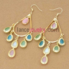 Trendy zinc alloy earrings decorated with cat eye 