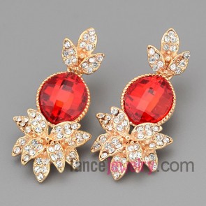 Dazzling earrings with gold brass decorated shiny crystal and red cat eyes 