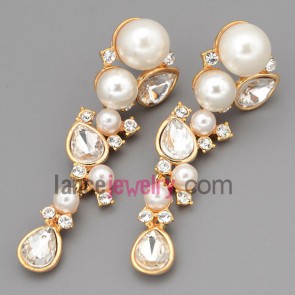 Elegant earrings with gold brass decorated abs and rhinestone and crystal pendant