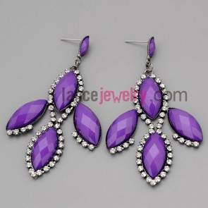 Elegant earrings with claw chain decorate many rhinestone and 
purple resin
